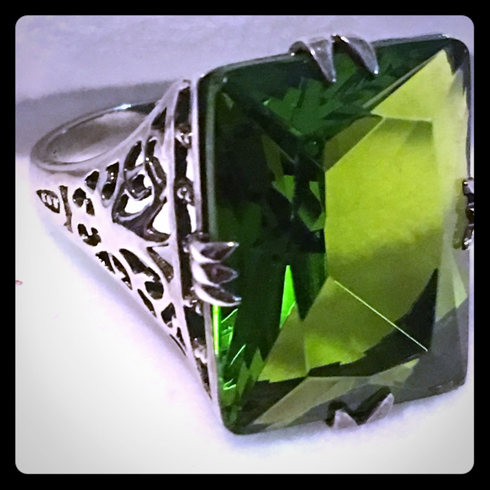 Sterling silver vintage setting with green  stone
